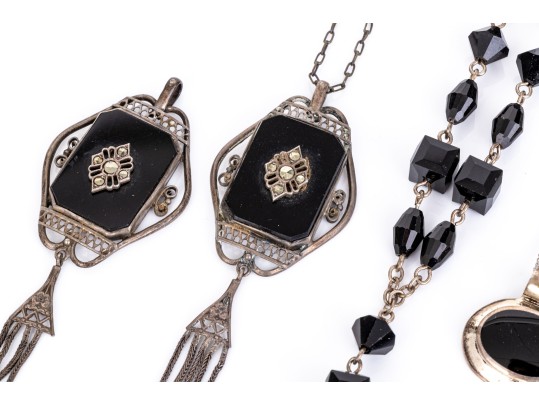 Collection Of Sterling Silver And Onyx Motif Jewelry Pieces