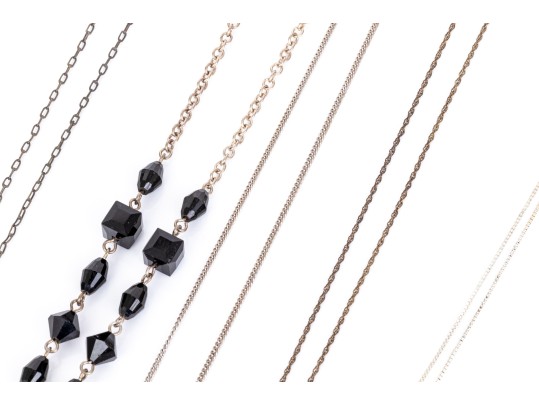 Collection Of Sterling Silver And Onyx Motif Jewelry Pieces