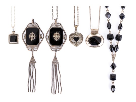 Collection Of Sterling Silver And Onyx Motif Jewelry Pieces