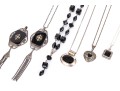 Collection Of Sterling Silver And Onyx Motif Jewelry Pieces