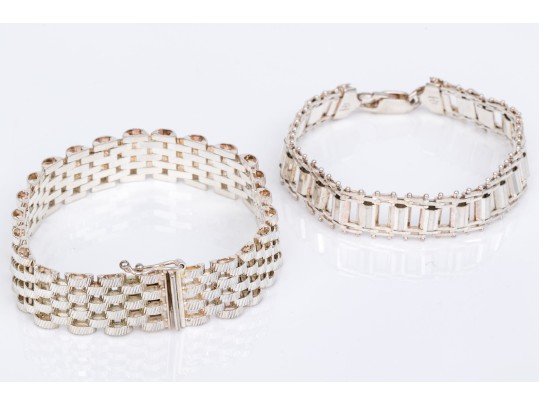 Sterling Silver Woven Bracelet Paired With A Sterling Silver Link Style Bracelet
