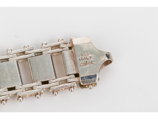 Sterling Silver Woven Bracelet Paired With A Sterling Silver Link Style Bracelet
