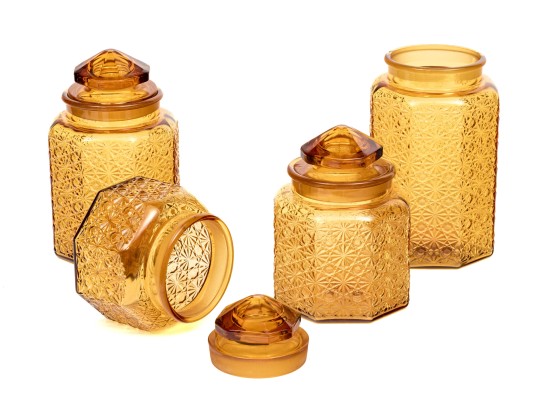 Collection Of Four Amber Glass Vessels With Three Lids