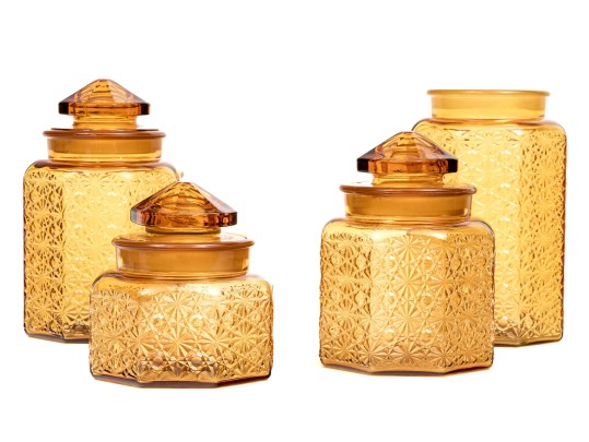 Collection Of Four Amber Glass Vessels With Three Lids
