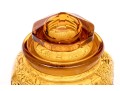 Collection Of Four Amber Glass Vessels With Three Lids