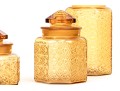 Collection Of Four Amber Glass Vessels With Three Lids