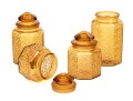 Collection Of Four Amber Glass Vessels With Three Lids