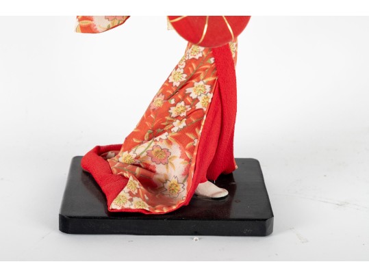 Japanese Geisha Doll In Red Kimono