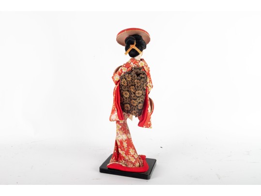 Japanese Geisha Doll In Red Kimono