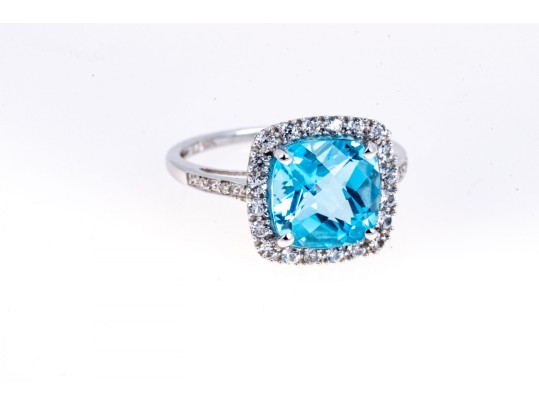 Vibrant 10K White Gold And Blue Topaz Ring, Size 7+