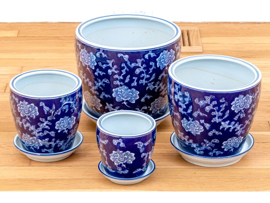 Group Of Four Blue And White Ceramic Jardinieres With Undertrays