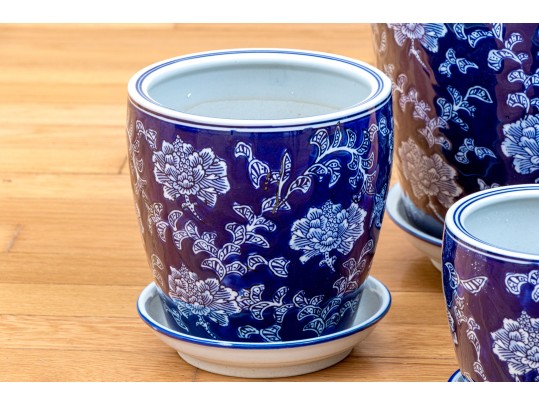 Group Of Four Blue And White Ceramic Jardinieres With Undertrays