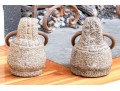 Pair Of Carved Stone And Iron Ring Door Stops