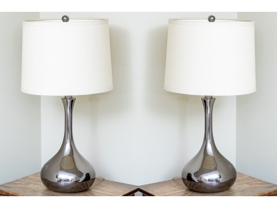 Pair Of Chrome Finished Bottle Form Table Lamps