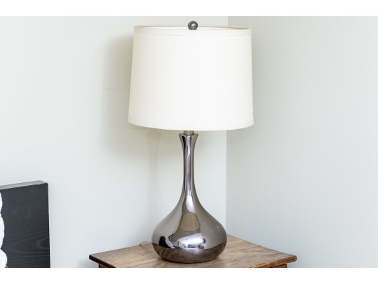 Pair Of Chrome Finished Bottle Form Table Lamps