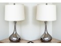 Pair Of Chrome Finished Bottle Form Table Lamps