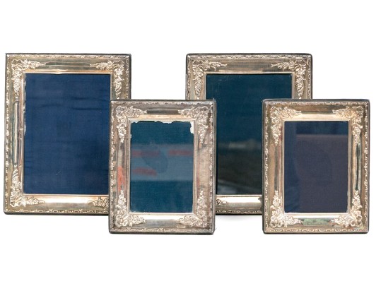 Collection Of Four Sterling Silver Mounted Picture Frames