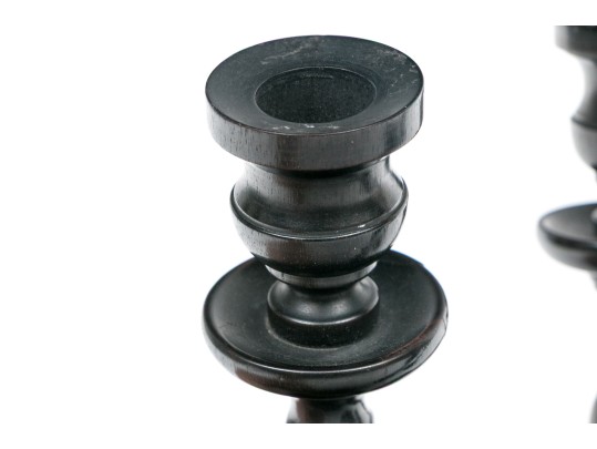 Grouping Of Four Carved Ebony Candlesticks, Including Two Pairs