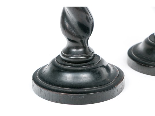 Grouping Of Four Carved Ebony Candlesticks, Including Two Pairs