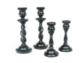 Grouping Of Four Carved Ebony Candlesticks, Including Two Pairs