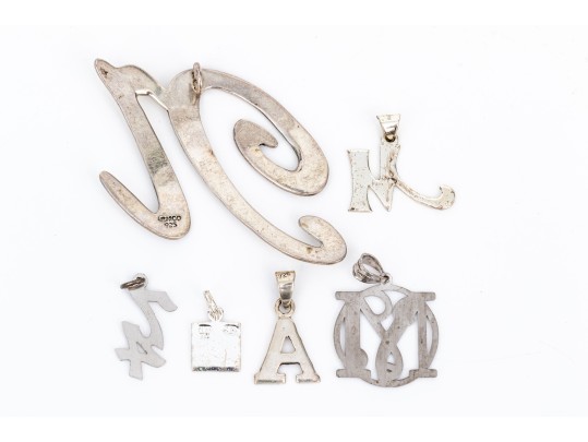 Collection Of Assorted Sterling Silver Pendants