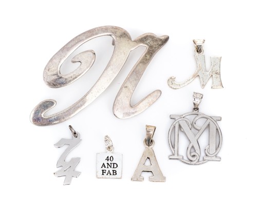 Collection Of Assorted Sterling Silver Pendants