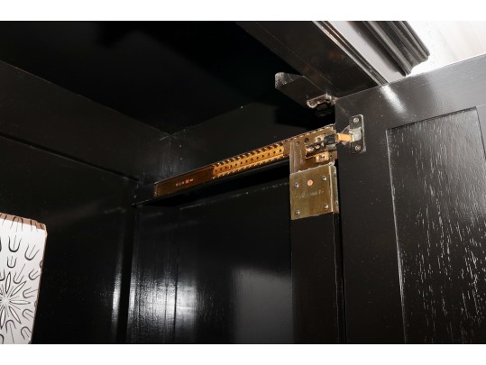 Black Lacquered Armoire With Retractable Doors And Hidden Storage Drawers