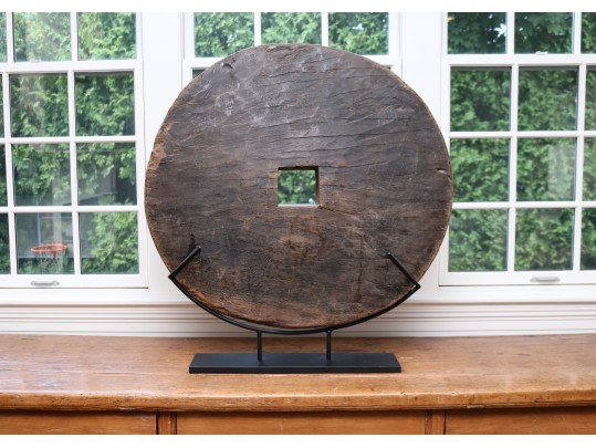 Southeast Asian Wooden Ox Cart Wheel On Custom Metal Stand