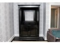 Black Lacquered Armoire With Retractable Doors And Hidden Storage Drawers