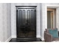 Black Lacquered Armoire With Retractable Doors And Hidden Storage Drawers