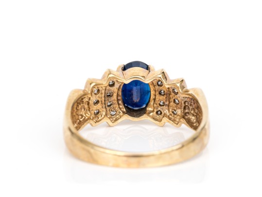 10k Yellow Gold Sapphire And Channel Diamond Set Ring, App. 0.14 TCW, Size 9