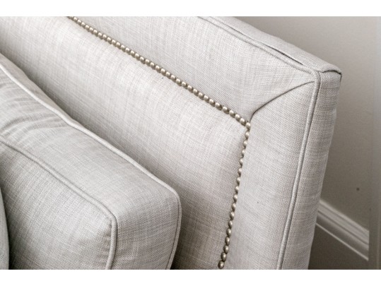 Handsome Upholstered Down-Wrapped Sofa ($5,000)