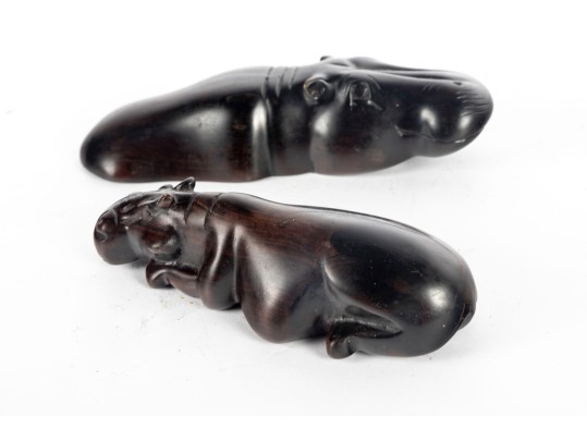 Two Ebony Wood Hippopotamus Carvings