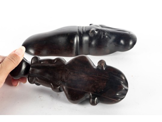 Two Ebony Wood Hippopotamus Carvings