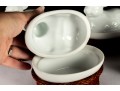 Set Of Four Porcelain Rabbit Covered Dishes With Wicker Holders