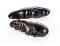 Two Ebony Wood Hippopotamus Carvings