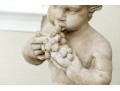 Pair Of Cast Stone Neoclassical Putti With Grape Clusters