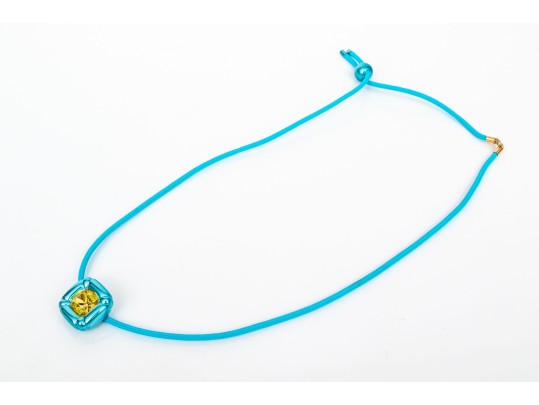 Swarovski Crystal Contemporary Blue Metallic And Cord Necklace With Yellow Crystal Center