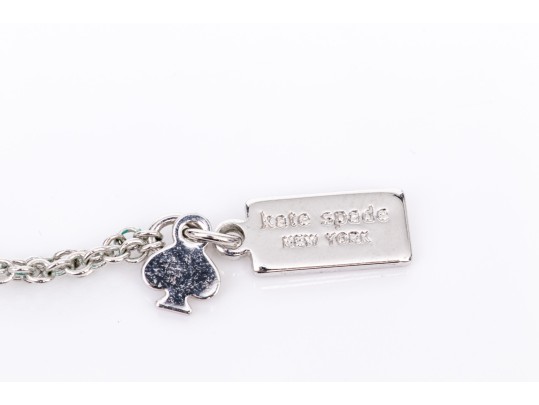 Kate Spade Pair Of Crystal Set Jewelry Pieces, Including Champagne Bottle Drop Pendant Earrings