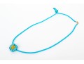 Swarovski Crystal Contemporary Blue Metallic And Cord Necklace With Yellow Crystal Center