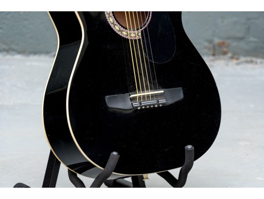 Rogue Acoustic Six String Guitar On Stand