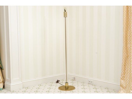Sleek Brass And Glass Floor Lamp