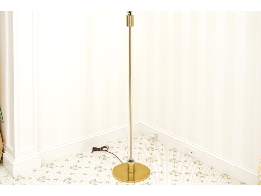 Sleek Brass And Glass Floor Lamp