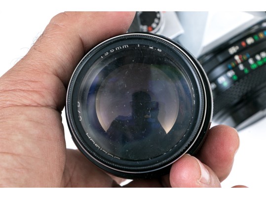 Pentax MX And Fujica ST605 Cameras, Two Lenses, And Binoculars