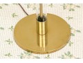 Sleek Brass And Glass Floor Lamp
