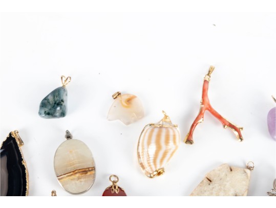Collection Of Stone, Coral, And Shell Pendants (12 Pieces)