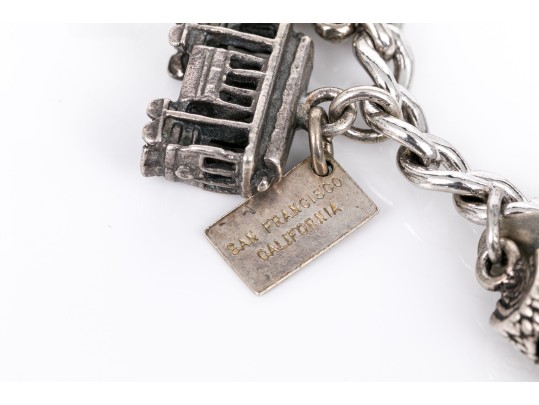 Curb Link Charm Bracelet With Assorted Sterling And Silverplate Charms, Some Loose