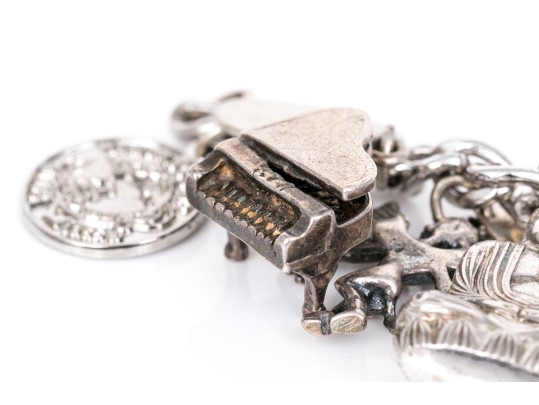 Curb Link Charm Bracelet With Assorted Sterling And Silverplate Charms, Some Loose