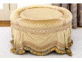Decadent Velvet Upholstered Ottoman With Tassel Trim