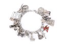 Curb Link Charm Bracelet With Assorted Sterling And Silverplate Charms, Some Loose